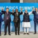 Lula participa de reunião virtual do Brics, discutindo comércio entre países do Sul Global, uso de moedas nacionais e reformas globais. Encontro ocorre após tarifas dos EUA.