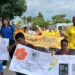 Moradores de Santo Antônio, em Vitória, participaram de caminhada do Maio Laranja em defesa da infância e adolescência. Mobilização reuniu comunidade e rede socioassistencial.