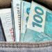 Bolsa Família paga nesta sexta-feira a parcela de agosto para beneficiários com NIS final 4. Valor mínimo é de R$ 600.